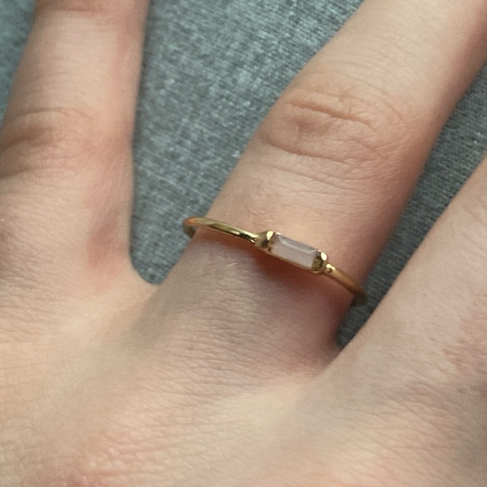 Elegant Gold Ring with White Stone